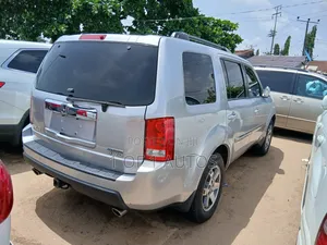 Honda Pilot Touring w/RES/Navi 4WD (3.5L 6cyl 5A) 2010 Silver