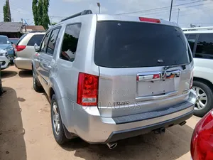 Honda Pilot Touring w/RES/Navi 4WD (3.5L 6cyl 5A) 2010 Silver