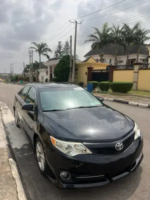 Toyota Camry SE Sport 4dr Sedan w/Prod. End 11/13 (2.5L 4cyl 6A) 2014
