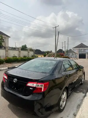 Toyota Camry SE Sport 4dr Sedan w/Prod. End 11/13 (2.5L 4cyl 6A) 2014