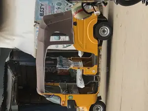 New Bajaj RE 2026 Yellow