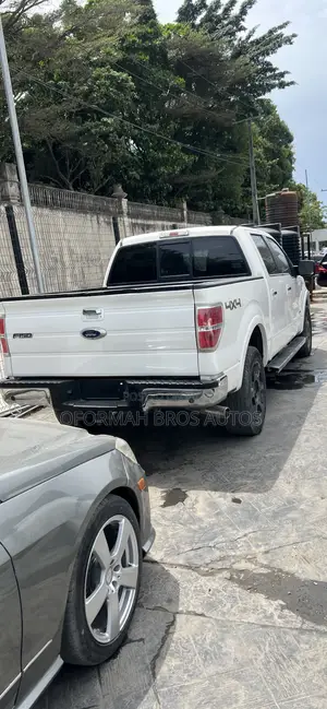 Ford F-150 Lariat 4dr SuperCab 4WD 6.5 ft. SB (5.0L 8cyl 6A) 2014 White