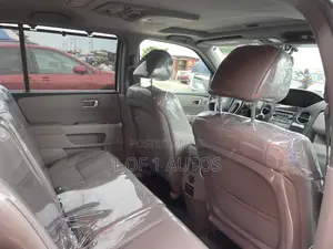 Honda Pilot Touring w/RES/Navi 4WD (3.5L 6cyl 5A) 2012 White