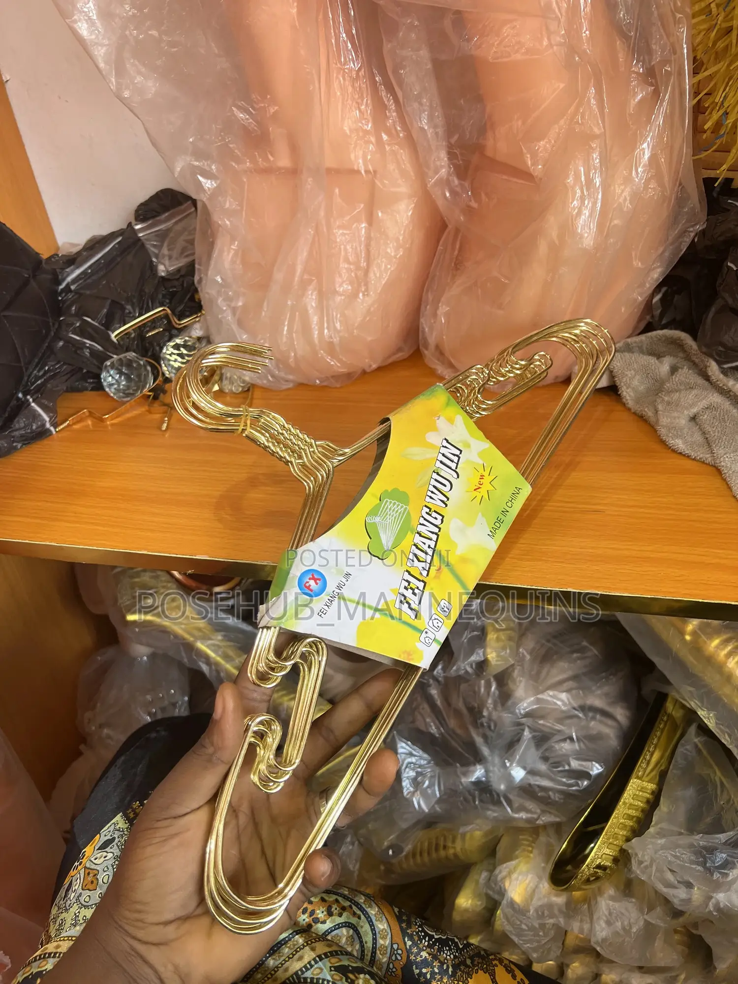 Gold Hanger For Cloth Display