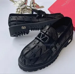 Valentino Garavani Black Shoes, Crafted for Elegance and Comfort.