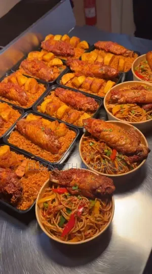 Jollof Rice, Plantain and Turkey / Spaghetti and Turkey