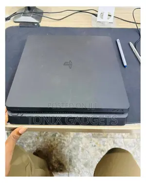 Neatly Used Ps4 Console 500gb With Two Controllers and Installed Games