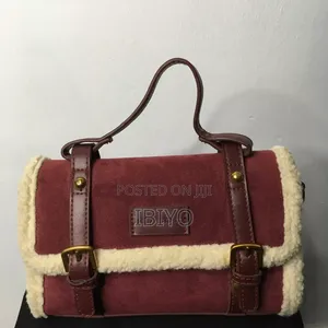 Unleash Your Inner Fashionista With This Suede Mini Bag