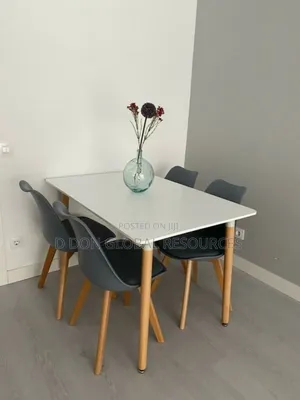 Dining Table by Four Seaters