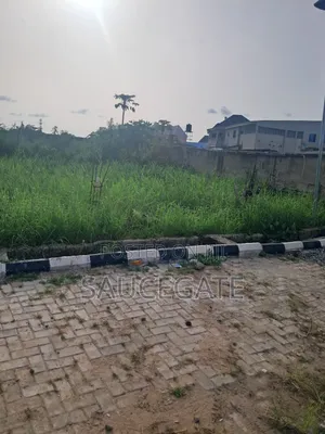 C of O Land in an Estate in Satellite Town