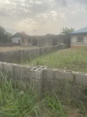 A Plot Of Land With A Two Bedroom Building Located At Ogun State Mowe