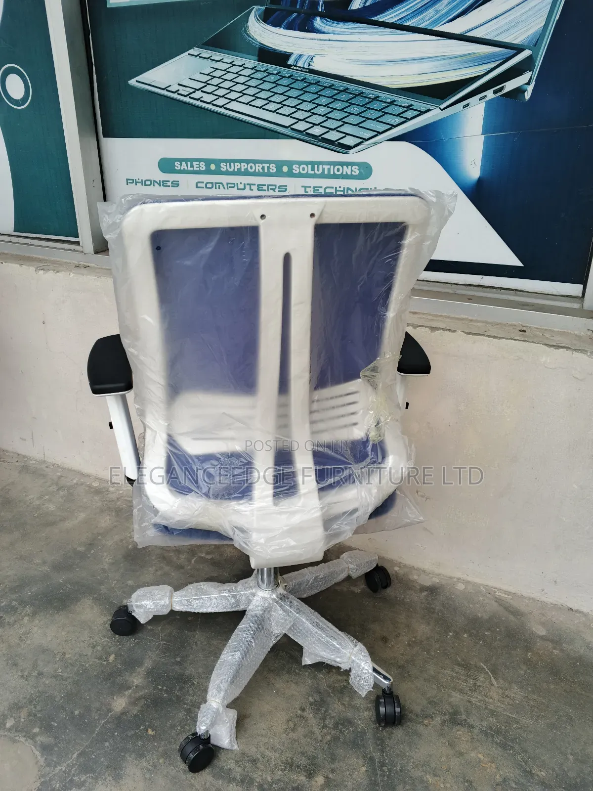 Blue Net Office Chair With Adjustable Arms and Recliner