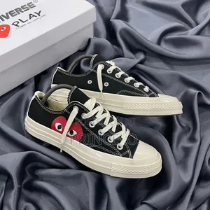 Comme Des Garçons X Play X Chuck Taylor Converse Low Sneakers