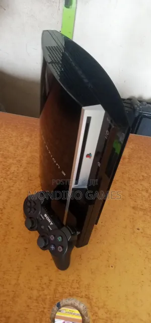 U K Used Sony Playstation 3 With Two Pads and Games10inside