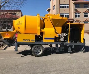 ￼ +2 This Machine Is A Self-loading Concrete Mixer,