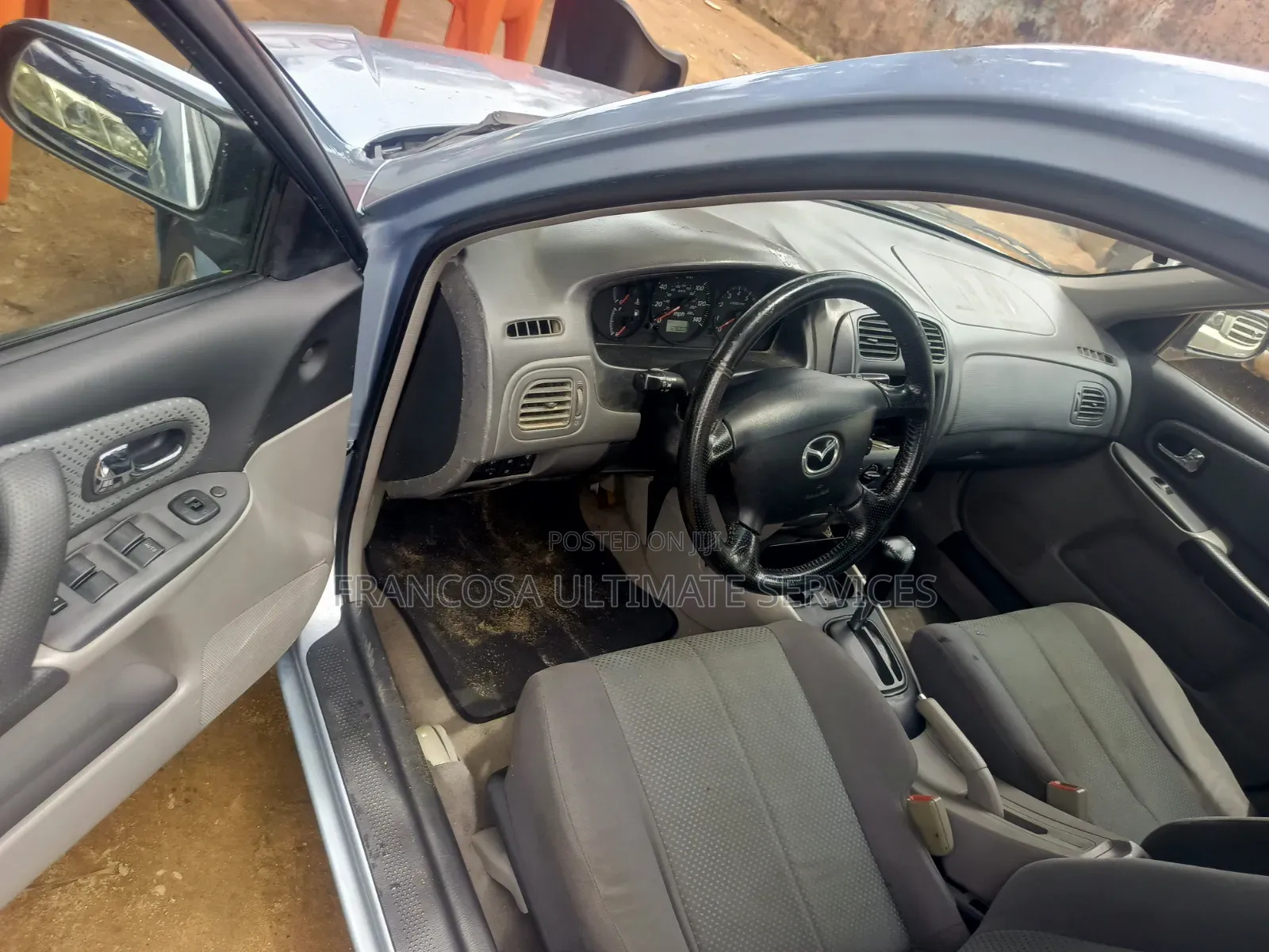 Mazda 323 2004 Blue