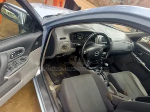 Mazda 323 2004 Blue