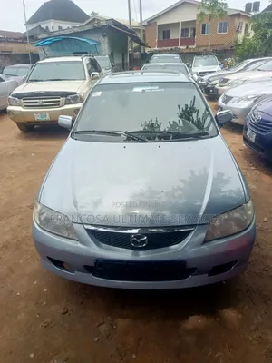 Mazda 323 2004 Blue