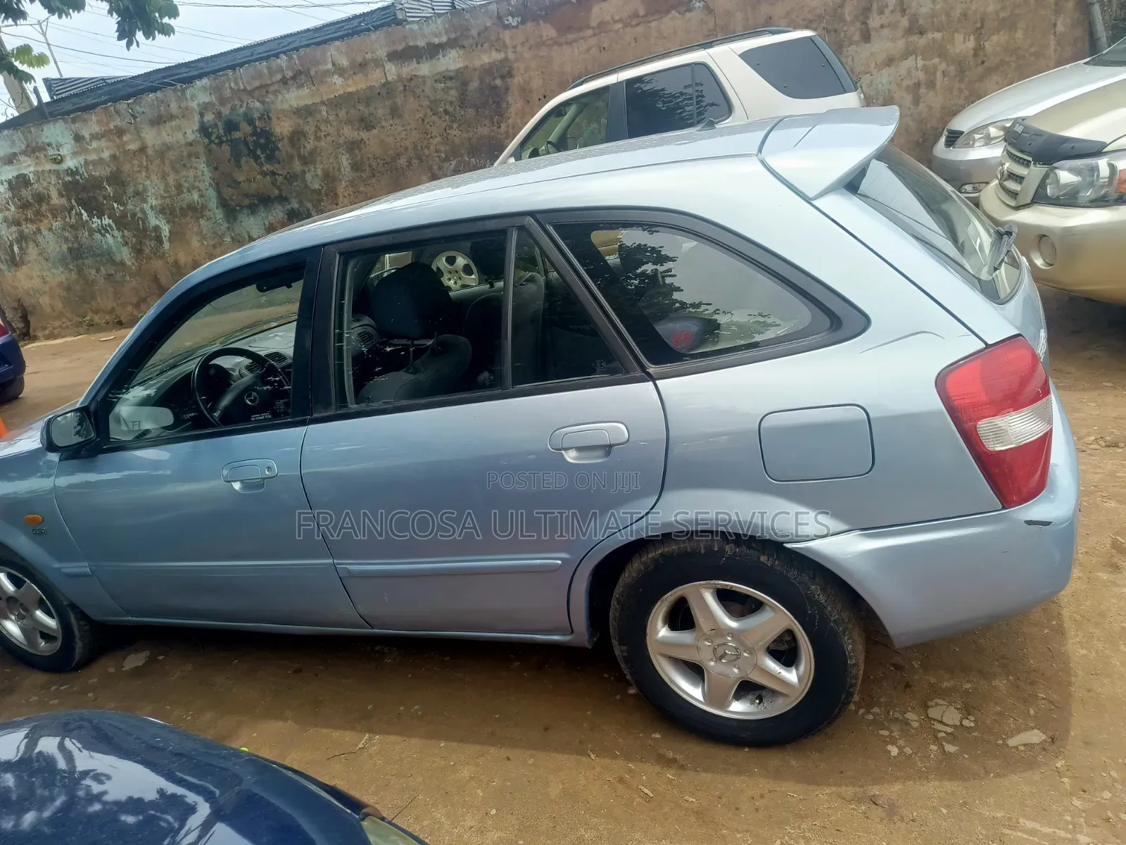 Mazda 323 2004 Blue