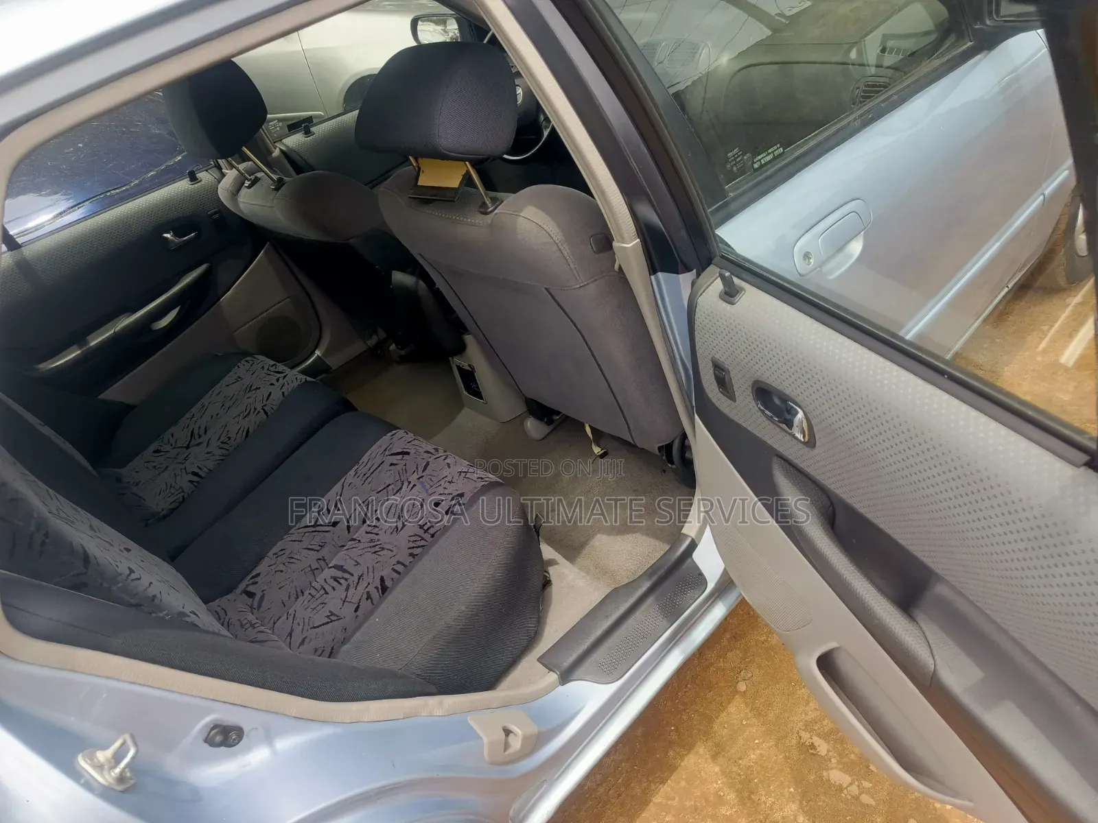 Mazda 323 2004 Blue