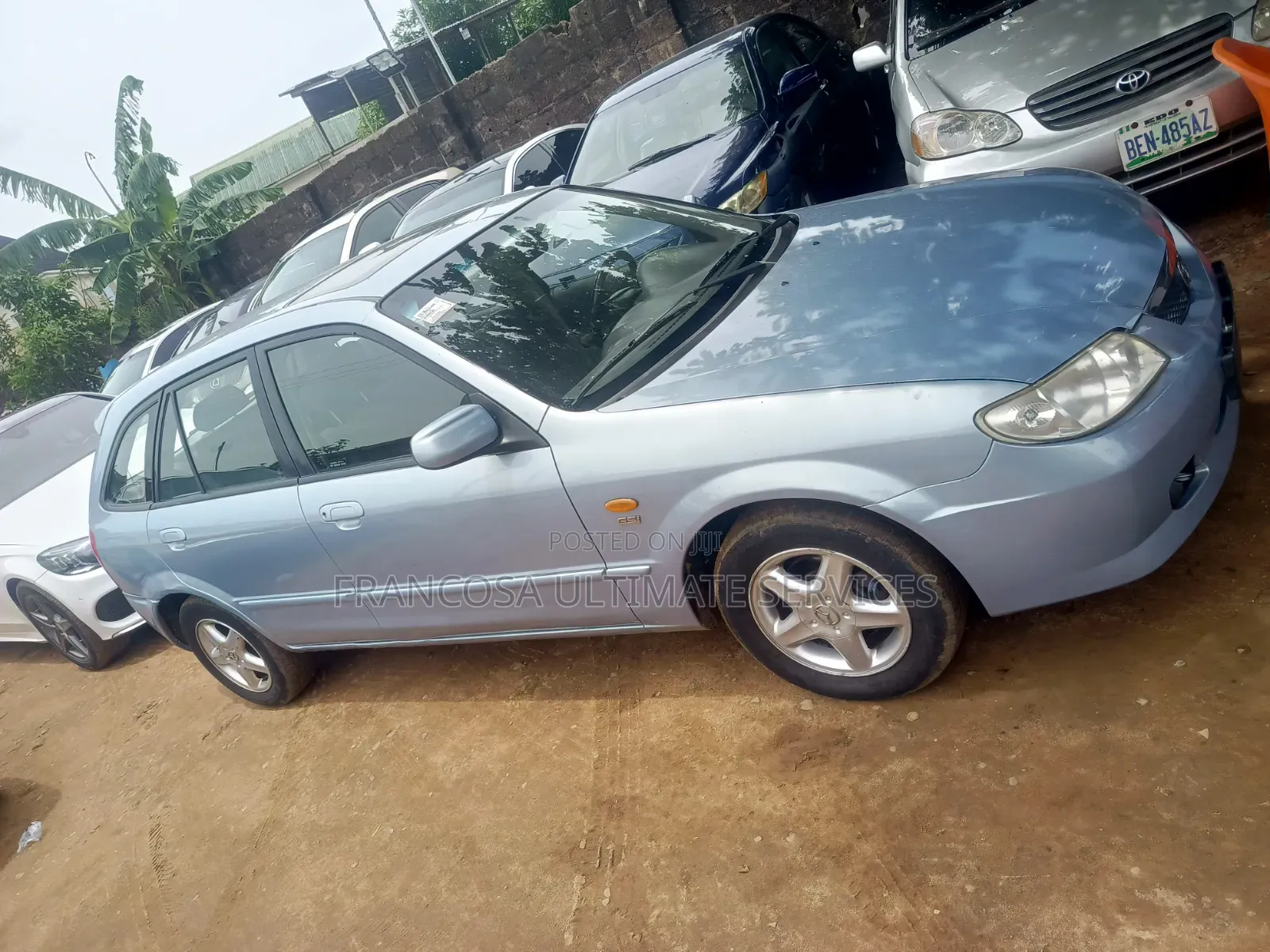Mazda 323 2004 Blue