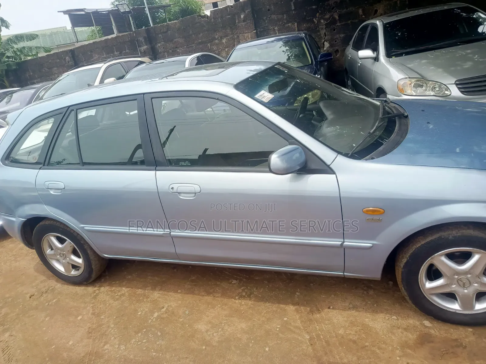Mazda 323 2004 Blue