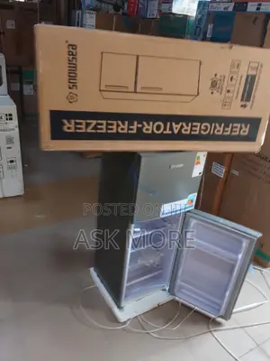 Snowsee Double-Door Refrigerator in Metallic Silver.