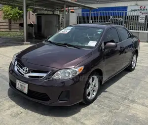 Toyota Corolla LE 4dr Sedan (1.8L 4cyl 4A) 2013 Burgundy