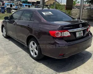 Toyota Corolla LE 4dr Sedan (1.8L 4cyl 4A) 2013 Burgundy