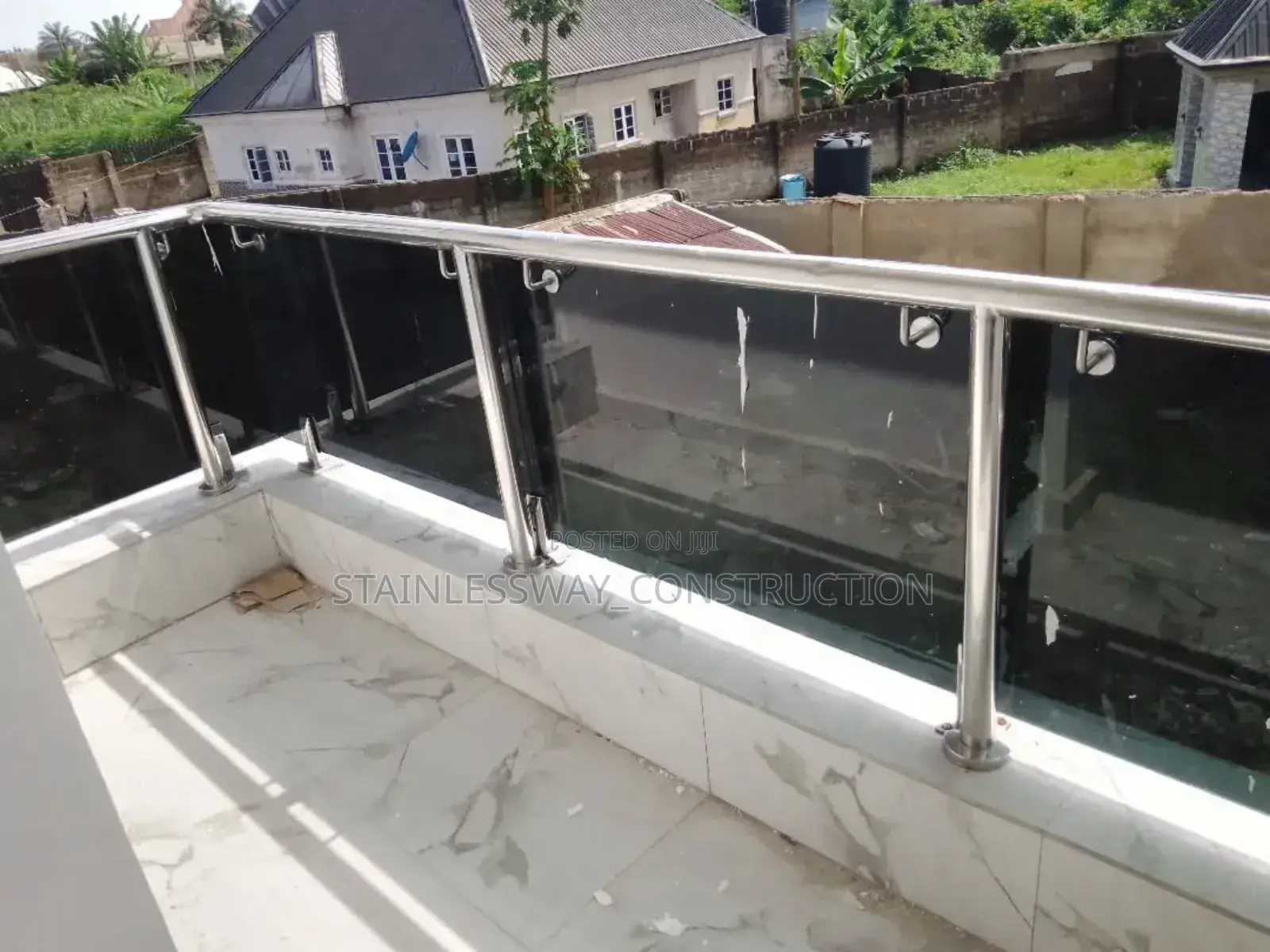 Dark Glass Balcony Handrails
