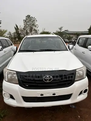 Registered 2014 Toyota Hilux (White) – Super Clean Condition