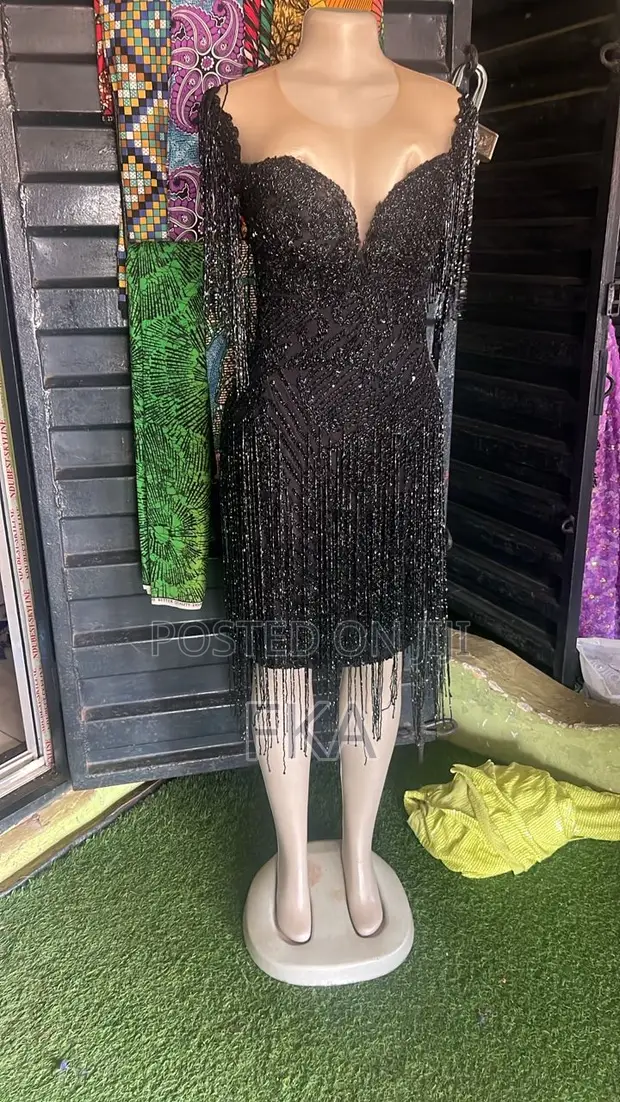 A Fitted Black Knee-Length Dress With a Neckline, Covered in Beads. for  sale - FKA  Price:  145,000 on Jiji.ng [Epe]