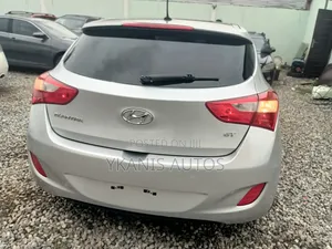 Hyundai Elantra GS Coupe FWD (1.8L 4cyl 6A) 2013 Silver