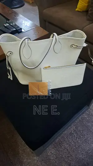 Lv Creme Empreinte Leather Neverfull Gm Bag