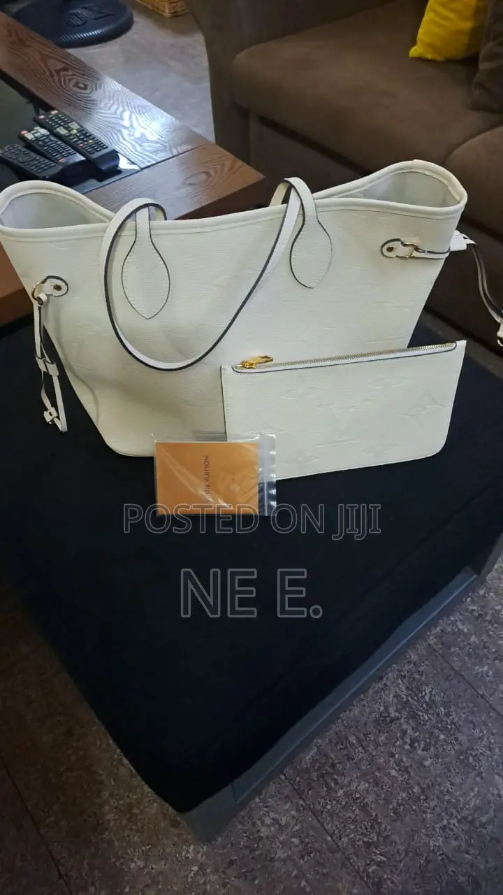 Lv Creme Empreinte Leather Neverfull Gm Bag