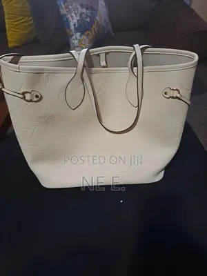 Lv Creme Empreinte Leather Neverfull Gm Bag
