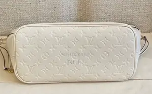 Lv Creme Empreinte Leather Neverfull Gm Bag