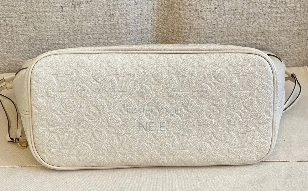 Lv Creme Empreinte Leather Neverfull Gm Bag