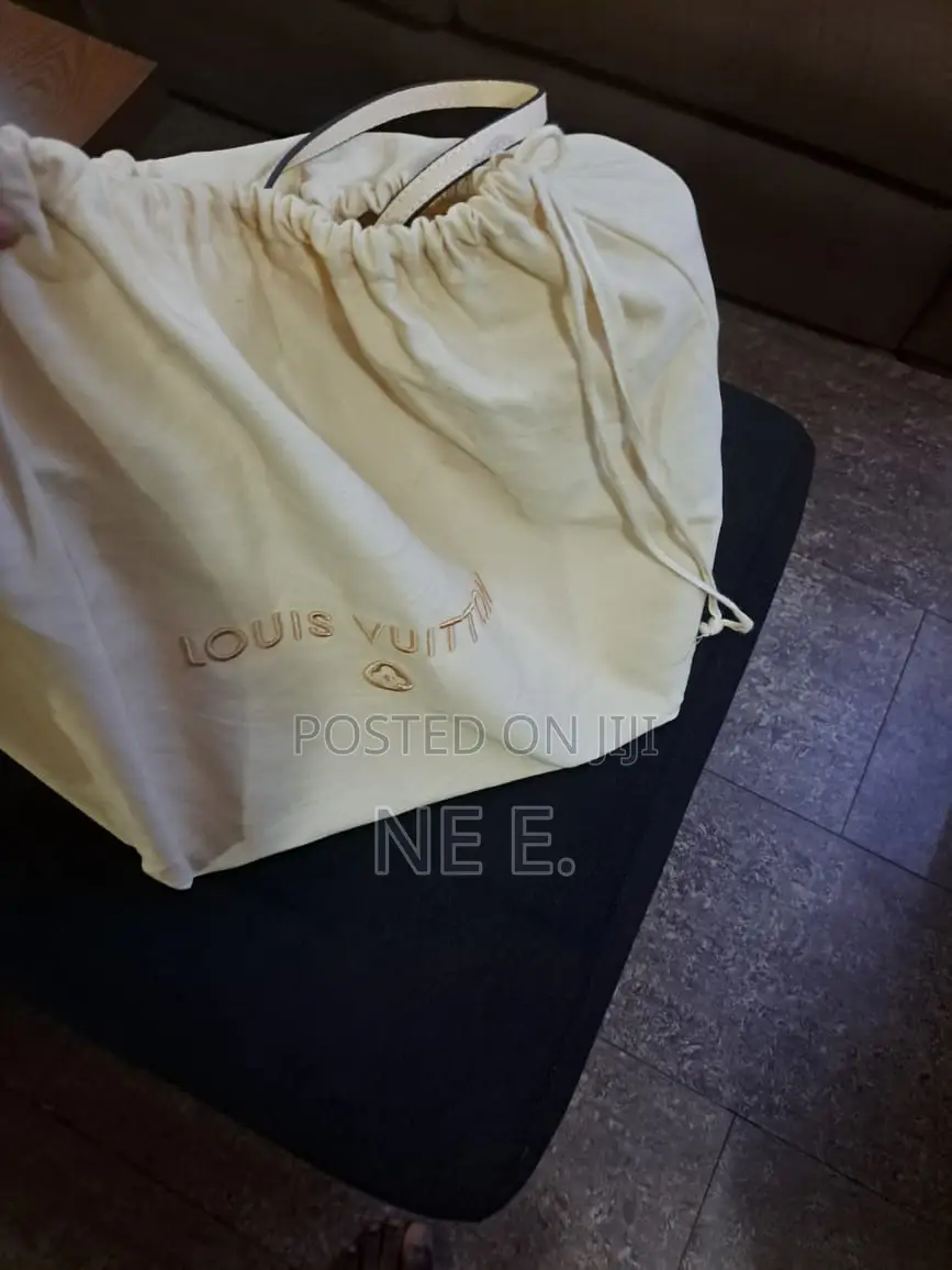 Lv Creme Empreinte Leather Neverfull Gm Bag