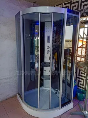 Multi-Functional Shower Cabin With a Curved Glass Design