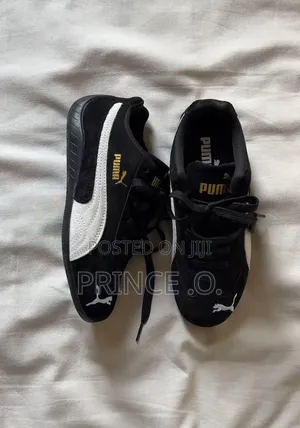 Black  White Striped Suede Puma Sneakers