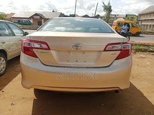 Toyota Camry LE 4dr Sedan (2.5L 4cyl 6A) 2012 Gold