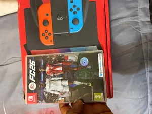 Open Box Nintendo Switch Oled With Fc26 Disc
