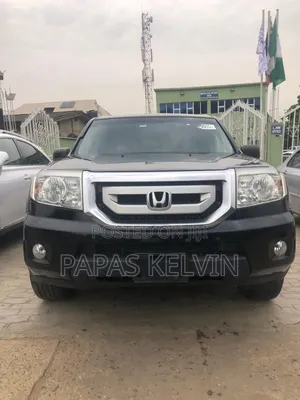 Honda Pilot Touring w/RES/Navi 4WD (3.5L 6cyl 5A) 2011 Black