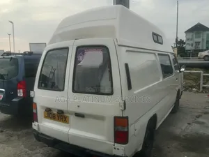 Nissan Caravan (Urvan) 1997 Beige