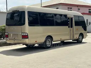 Toyota Coaster 2017 Gold