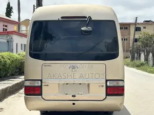 Toyota Coaster 2017 Gold