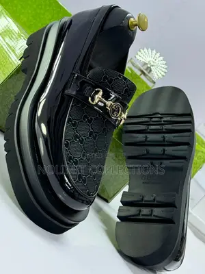Two Toned Men's Gucci Patterned Leather Loafers