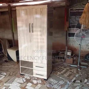 2 Doors Wardrobe. Measurements: 6 by 2ft8.