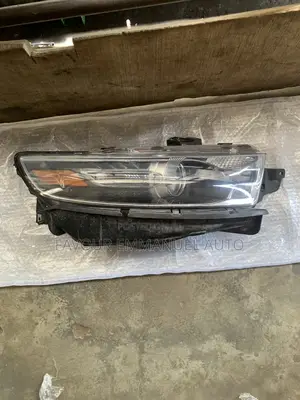 Headlamp Ford Taurus 2013